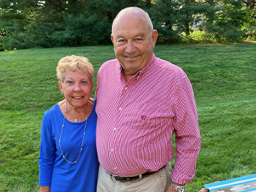 Irene Brightbill stands outside beside her husband, Robert.